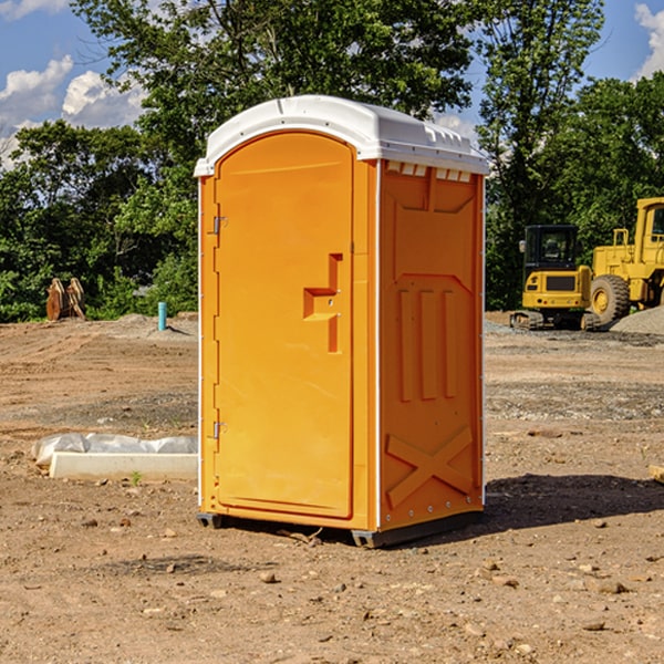 how often are the portable restrooms cleaned and serviced during a rental period in Colcord